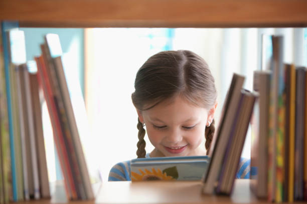 Girl looking at a book